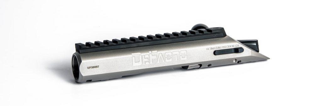 High-strength barrel nut for optimal rifle accuracy and safety Ultimatum Precision barrel nut securing a barrel to a DeFacto rifle action, highlighting its critical role in a custom build.