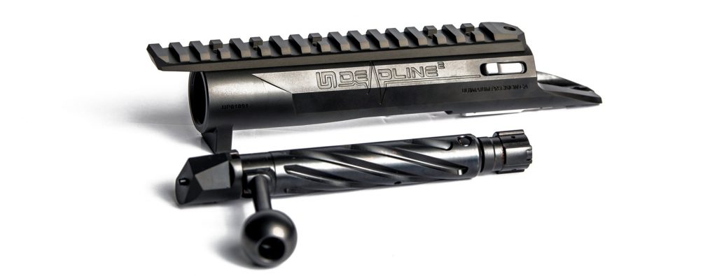 High-performance Canadian-made rifle actions for custom builds Ultimatum Precision Deadline short action installed in a custom rifle chassis, showcasing its sleek design.